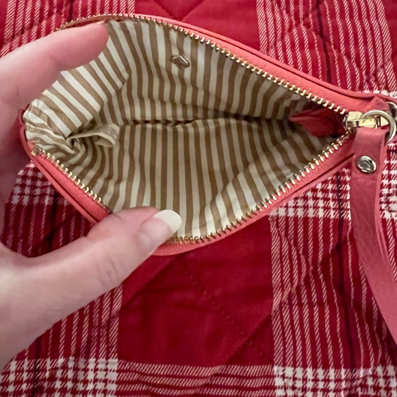 Kate Spade Coral Pebbled Leather Wristlet with Gold Accents. - Picture 3 of 10
